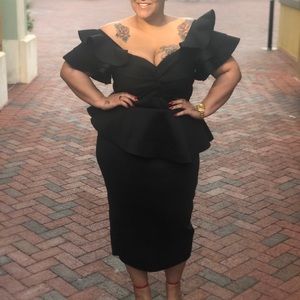 Black scuba knit peplum tea length dress